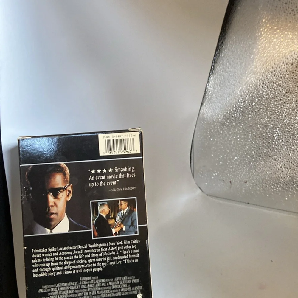 Malcolm X video by Spike Lee and Denzel Washington part 1 & 2 PG 201 minutes